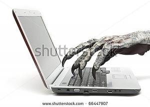-stock-photo-monster-hand-typing-computer-66447907.jpeg